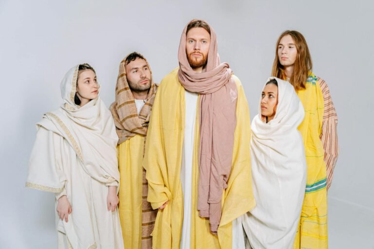 Adults in biblical costumes posing for a conceptual group studio shoot.