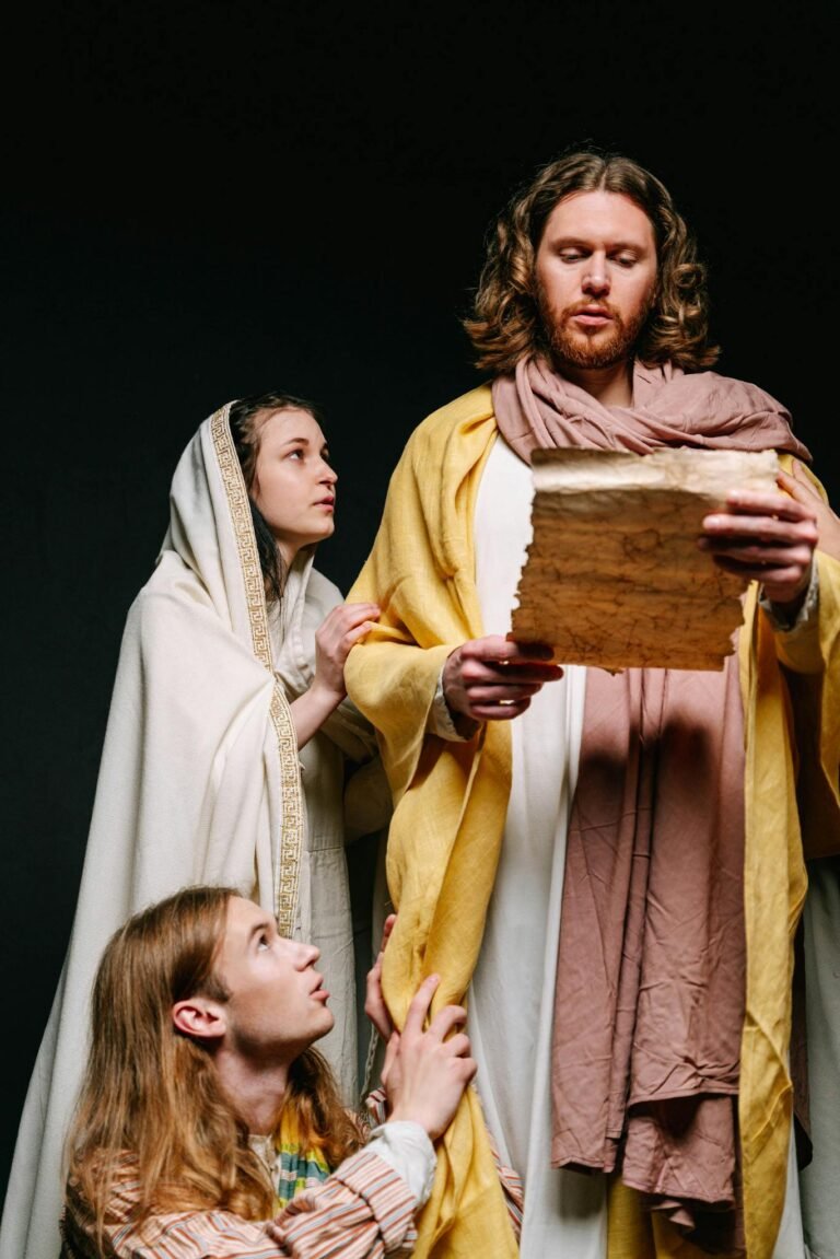 Costumed actors perform a biblical scene on stage, emphasizing dramatic storytelling and religious themes.